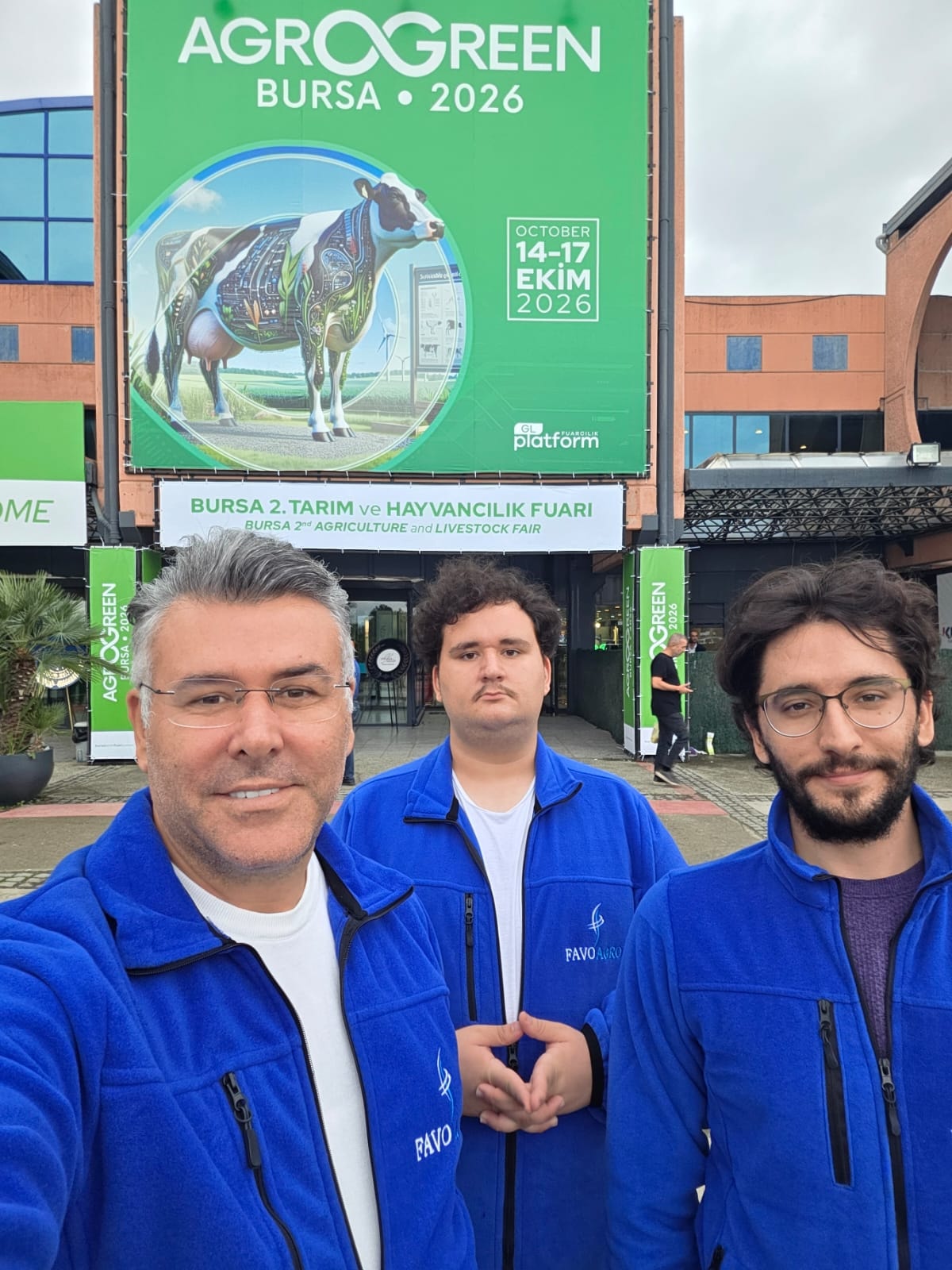 Together with our team at the fair entrance.